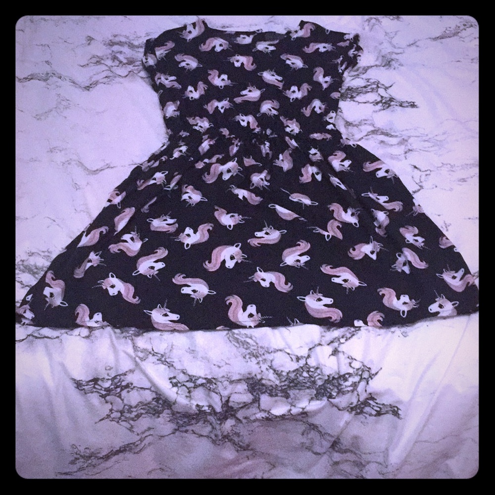 I am selling this black unicorn dress